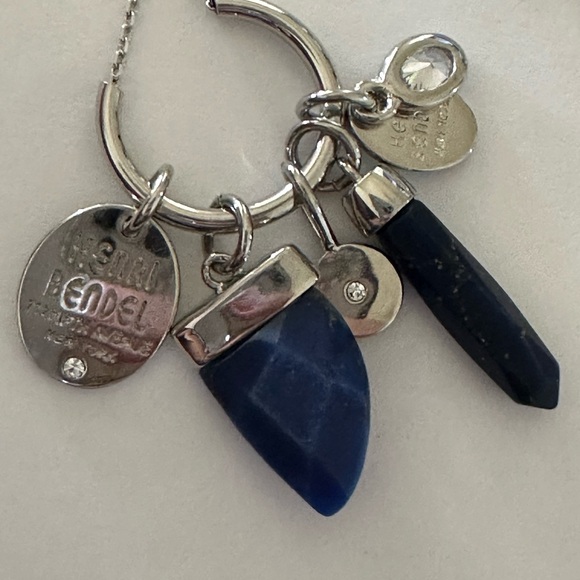 Henri Bendel  silver tone necklace with dark blue crystal and logo charms disc - Picture 9 of 9